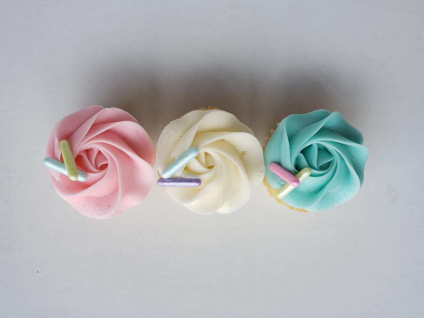 Mini Cupcakes with Rosettes and Oversized Sprinkles