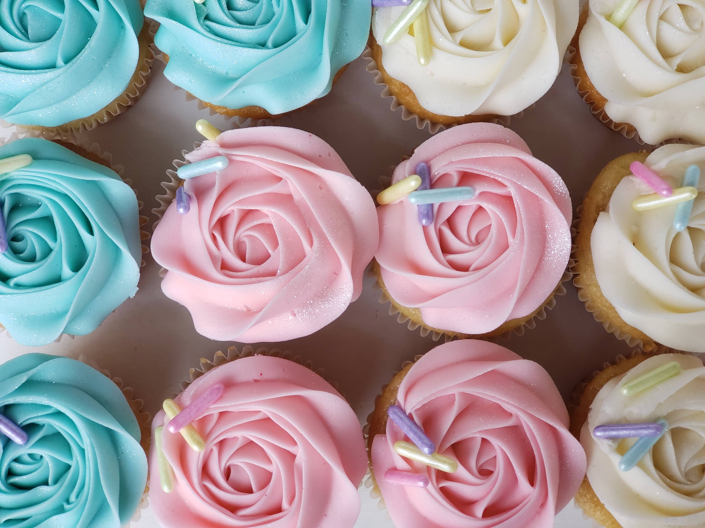 Regular Size Cupcakes with Rosettes and Oversized Sprinkles