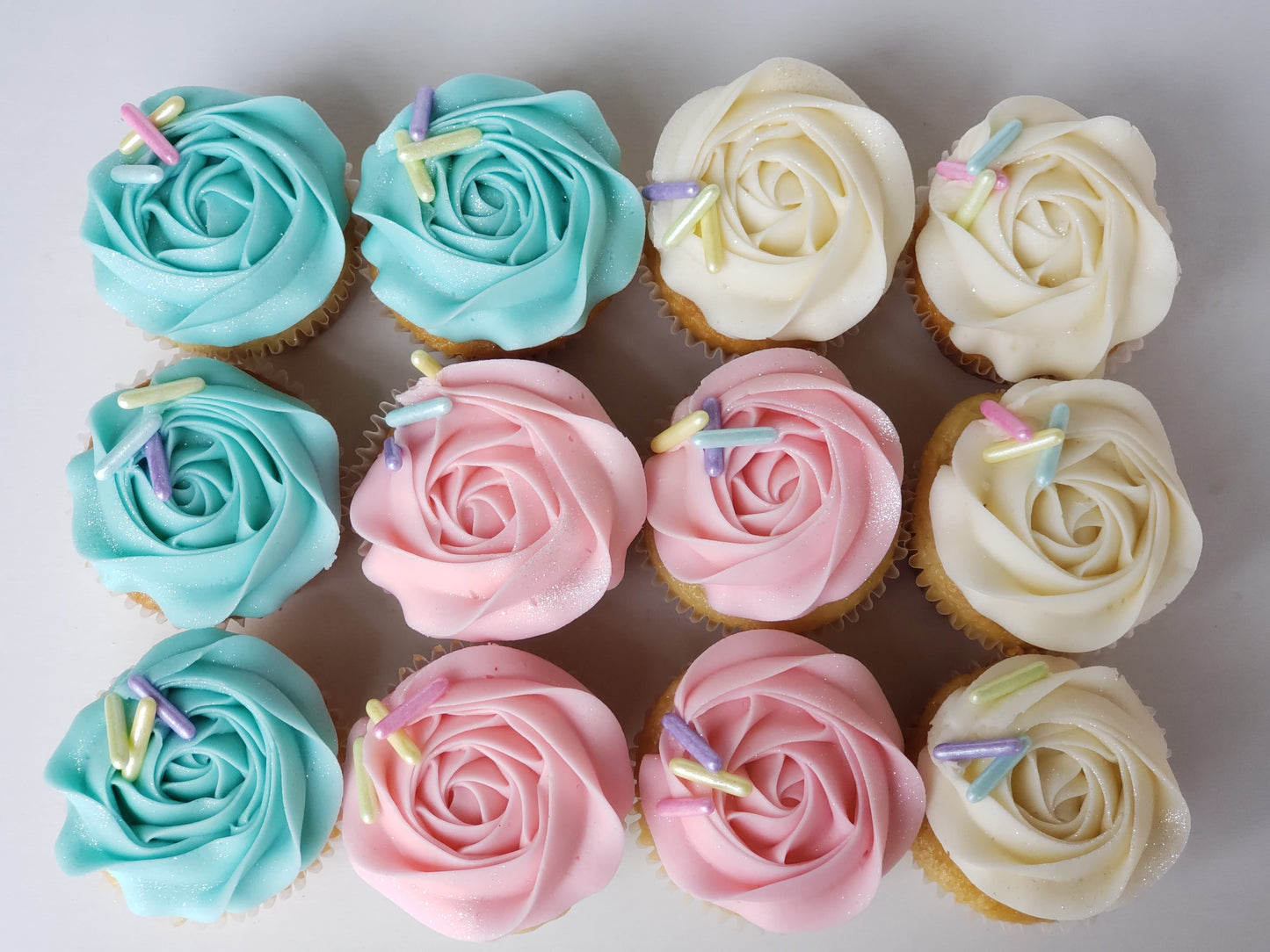 Regular Size Cupcakes with Rosettes and Oversized Sprinkles